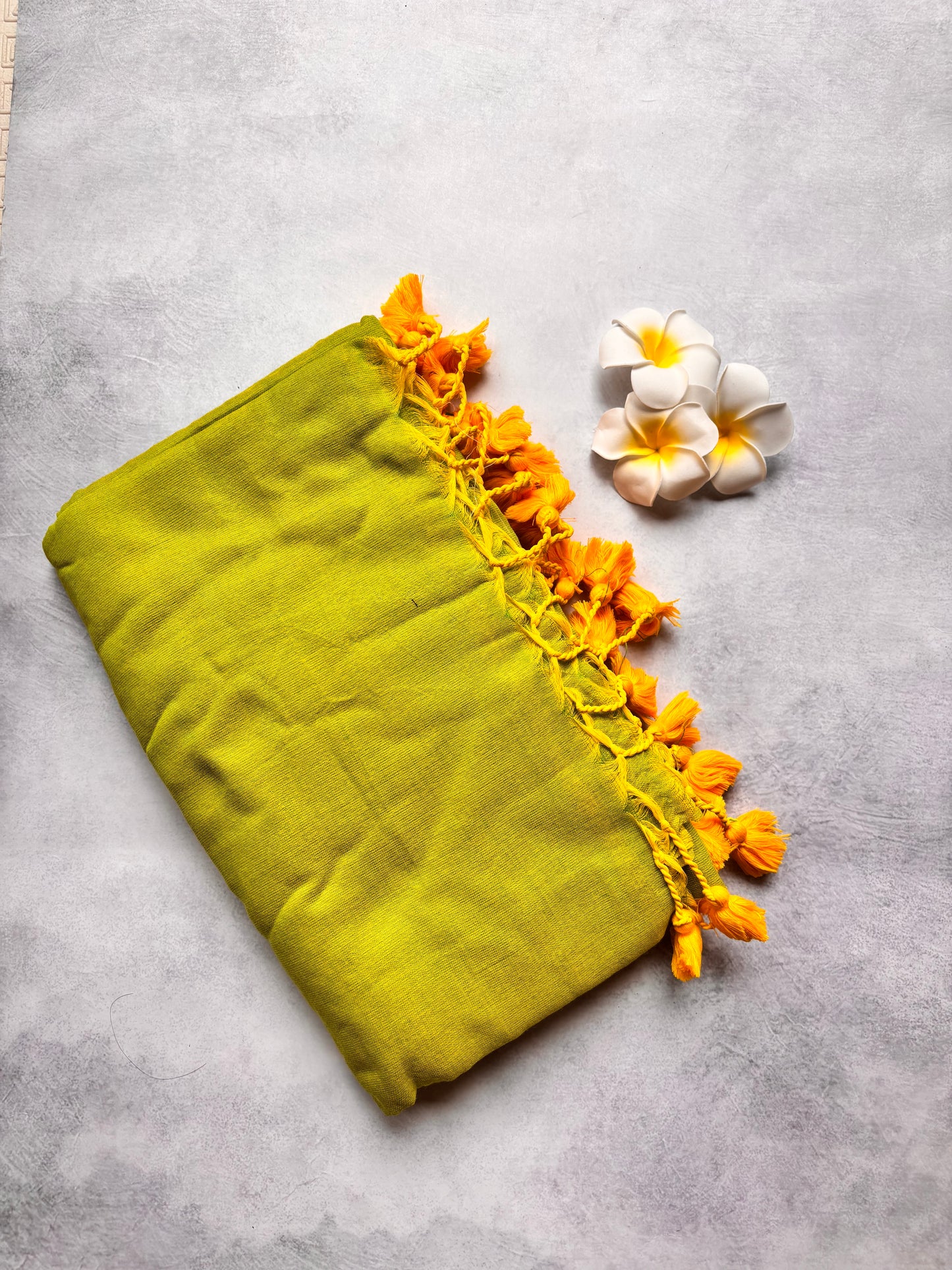 Plain Kadhi Cotton Saree in Parrot Green with Orange Tassels | The Laya Looms