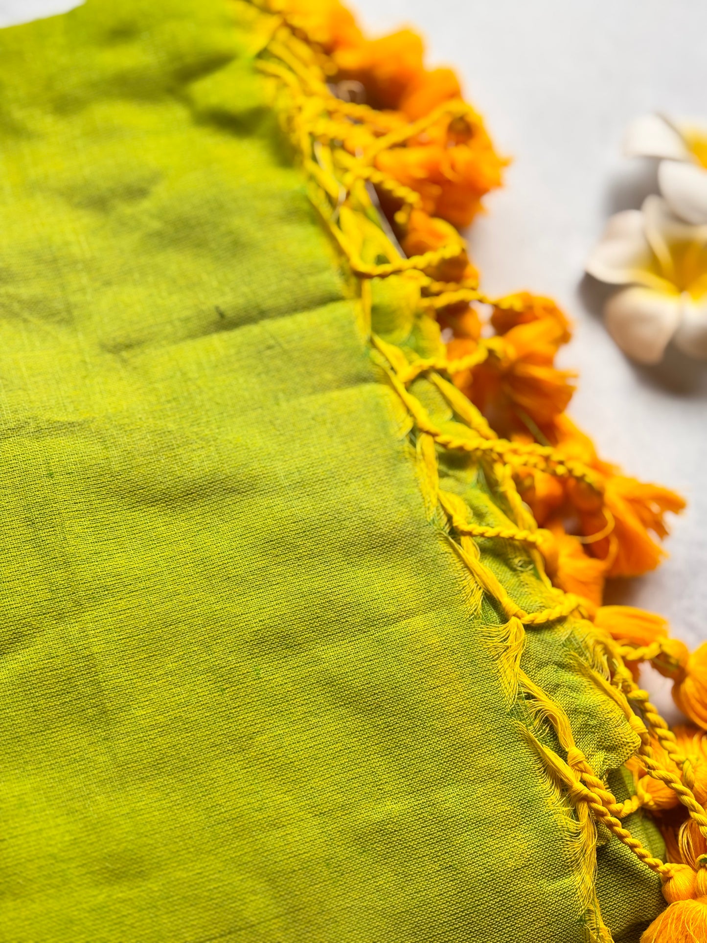 Plain Kadhi Cotton Saree in Parrot Green with Orange Tassels | The Laya Looms