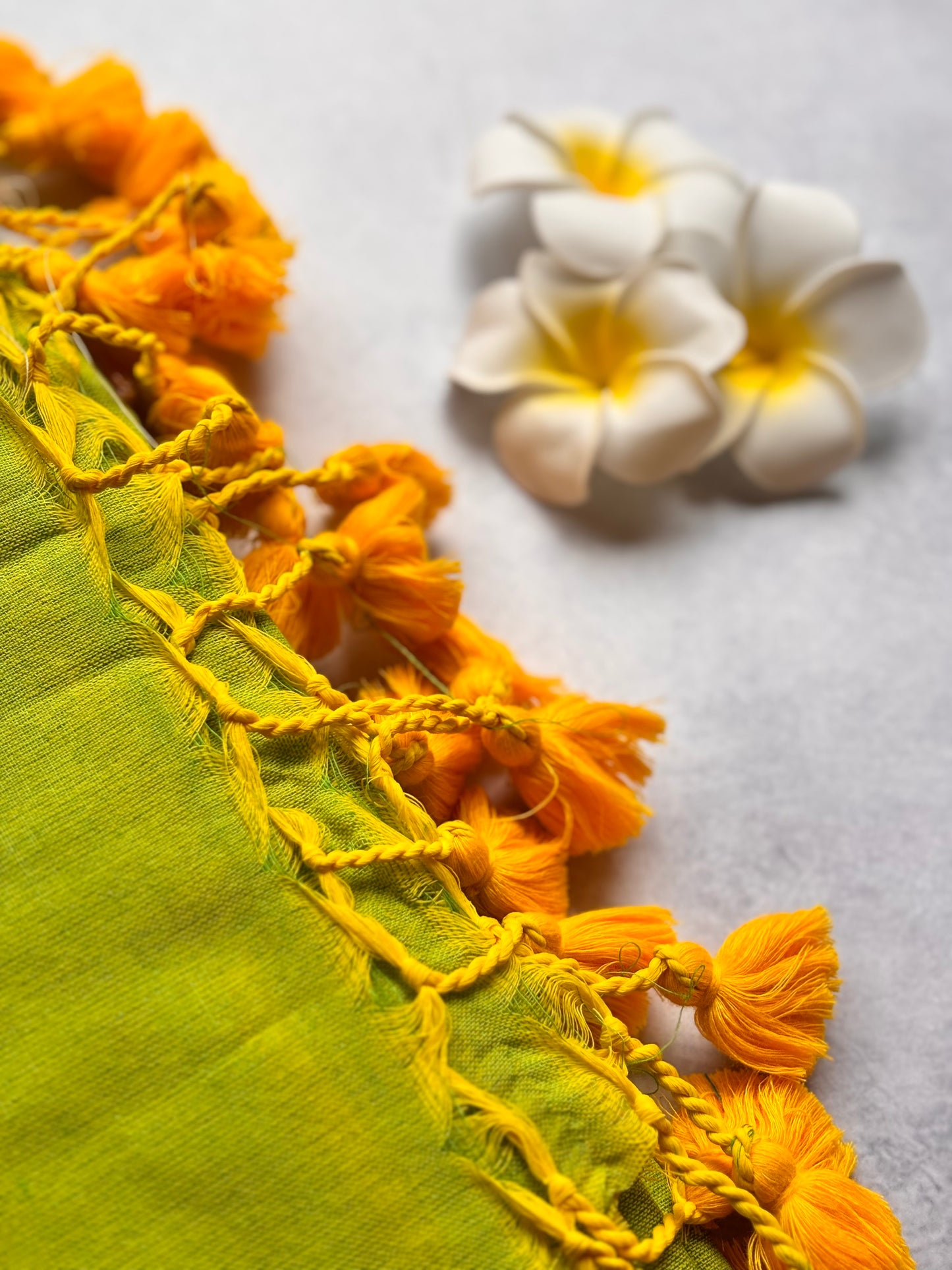 Plain Kadhi Cotton Saree in Parrot Green with Orange Tassels | The Laya Looms