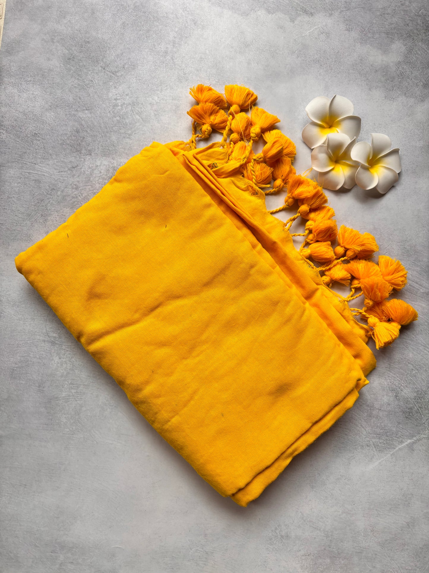 Plain mango Yellow Kadhi Cotton Saree with Yellow Tassels | The Laya Looms