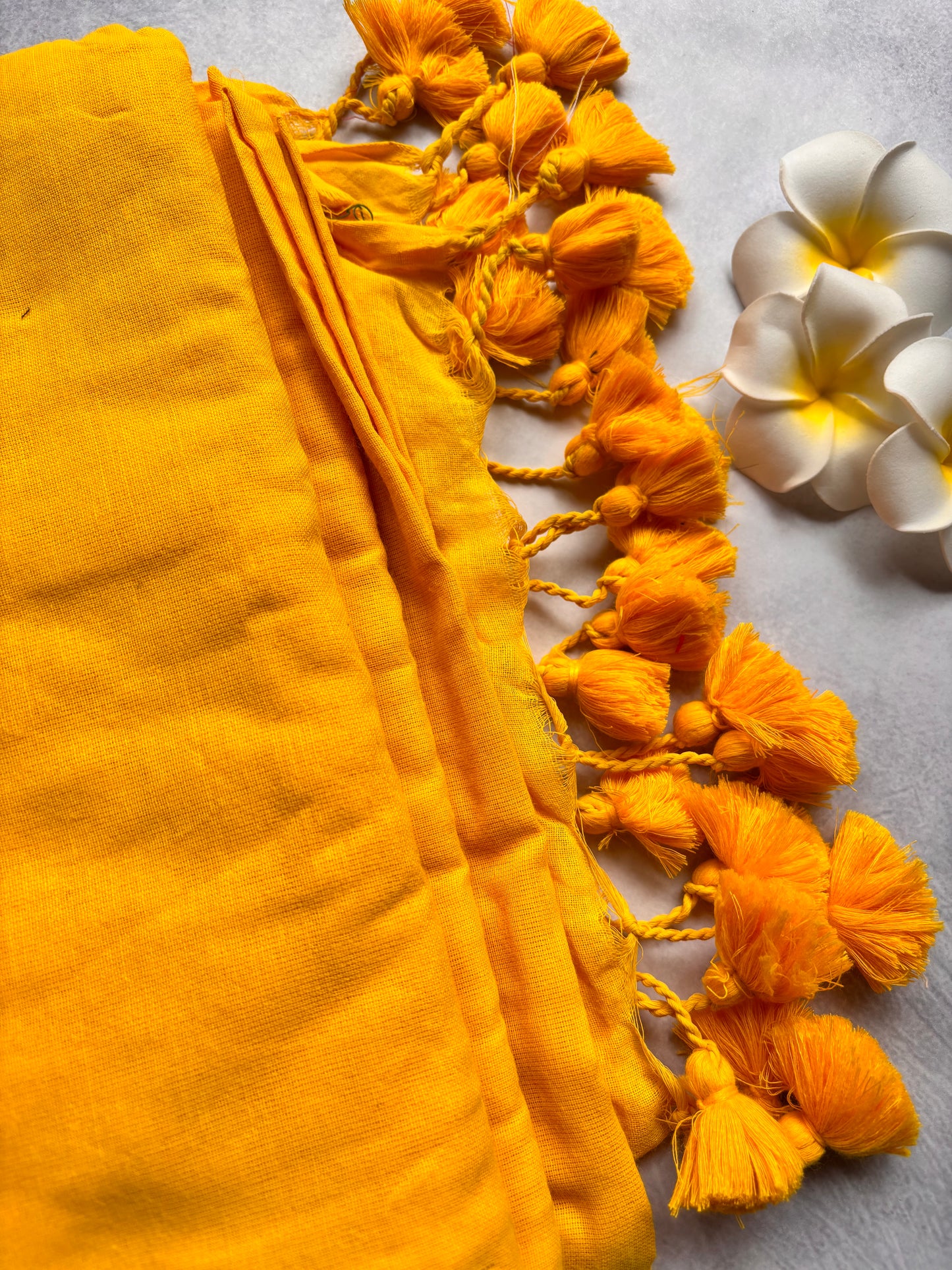 Plain mango Yellow Kadhi Cotton Saree with Yellow Tassels | The Laya Looms