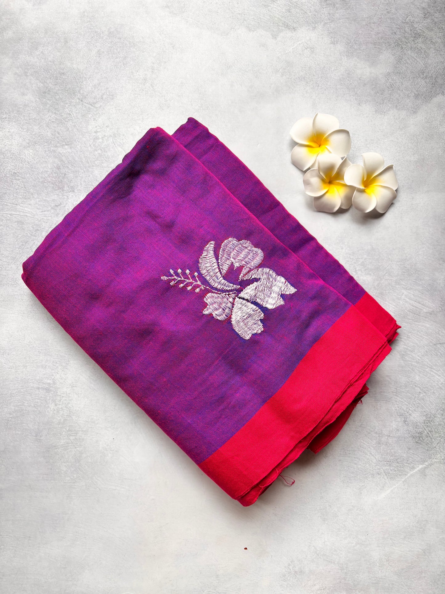 Kadhi Cotton Saree in Purple with White Embroidery Hibiscus & Pink Border | The Laya Looms