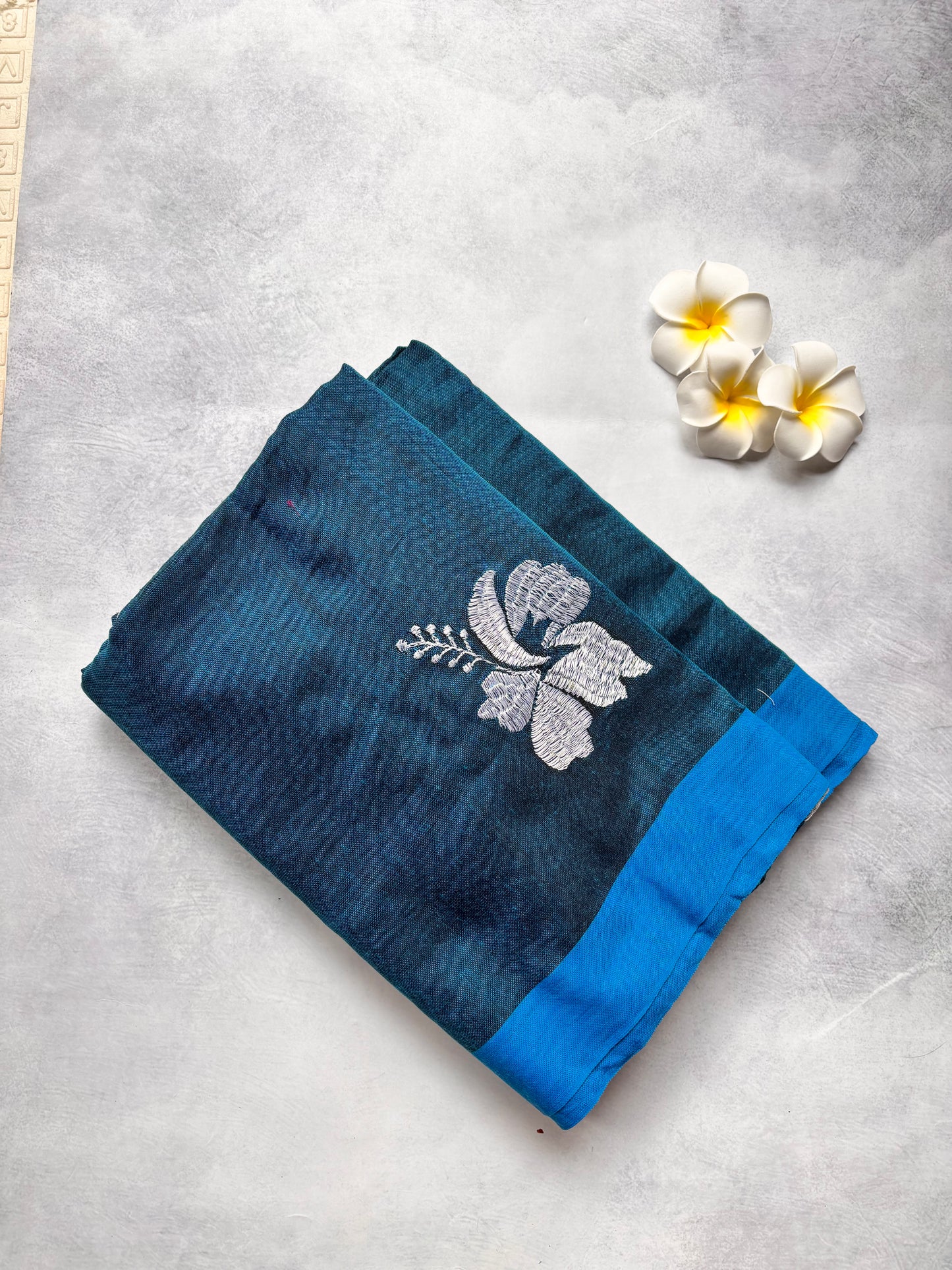 Teal Blue Kadhi Cotton Saree with White Embroidery & Blue Border | The Laya Looms