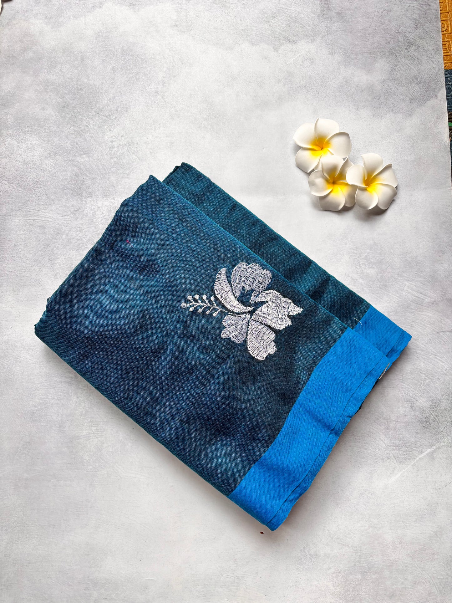 Teal Blue Kadhi Cotton Saree with White Embroidery & Blue Border | The Laya Looms