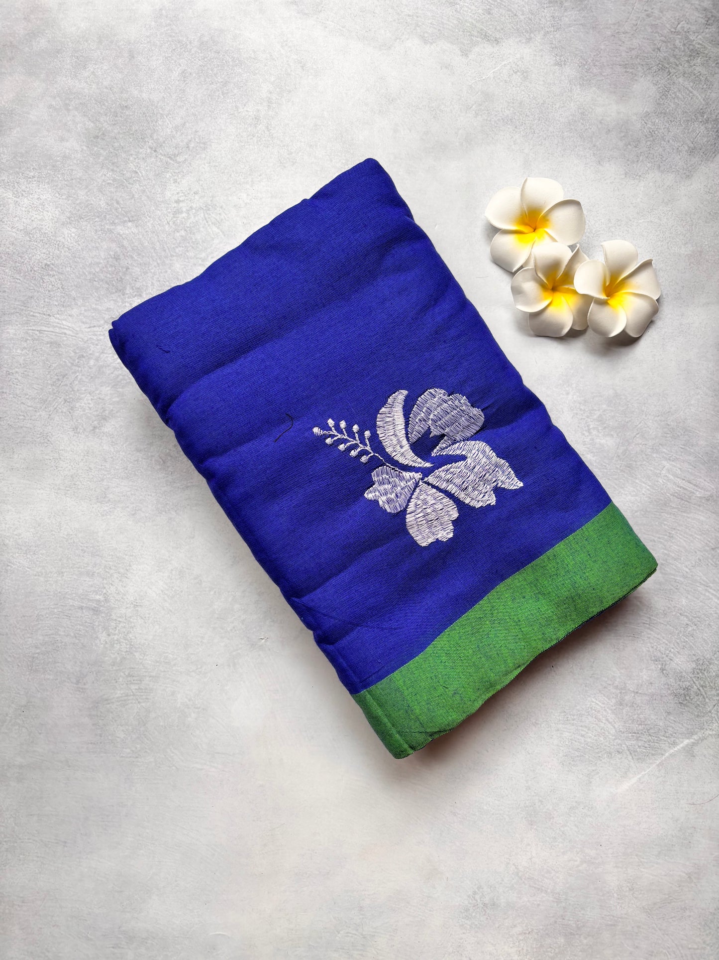 Royal Blue Kadhi Cotton Saree with White Hibiscus Embroidery & Green Border | The Laya Looms