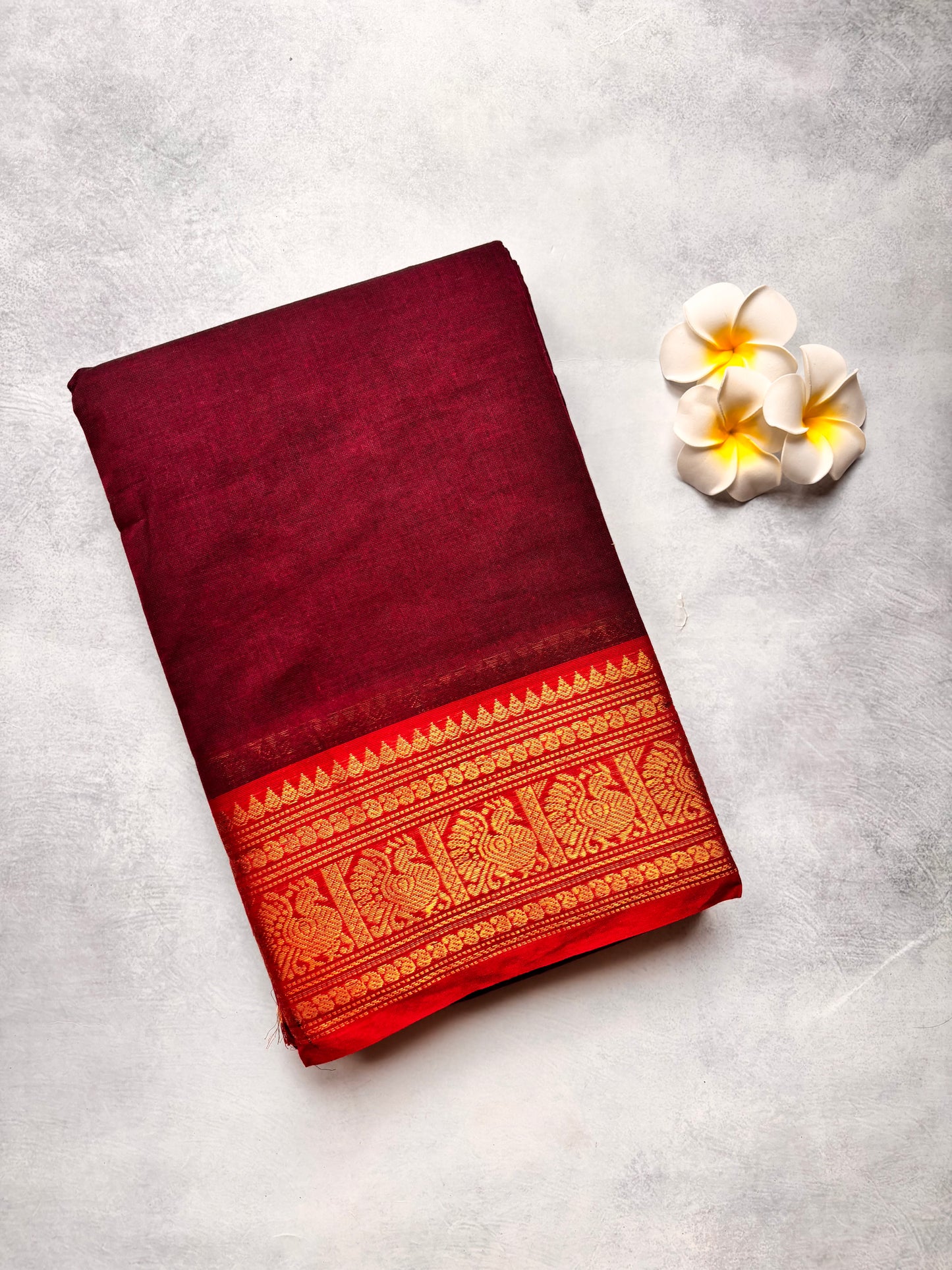 Maroon Kanchi Cotton Saree with Orange Annam Border | The Laya Looms