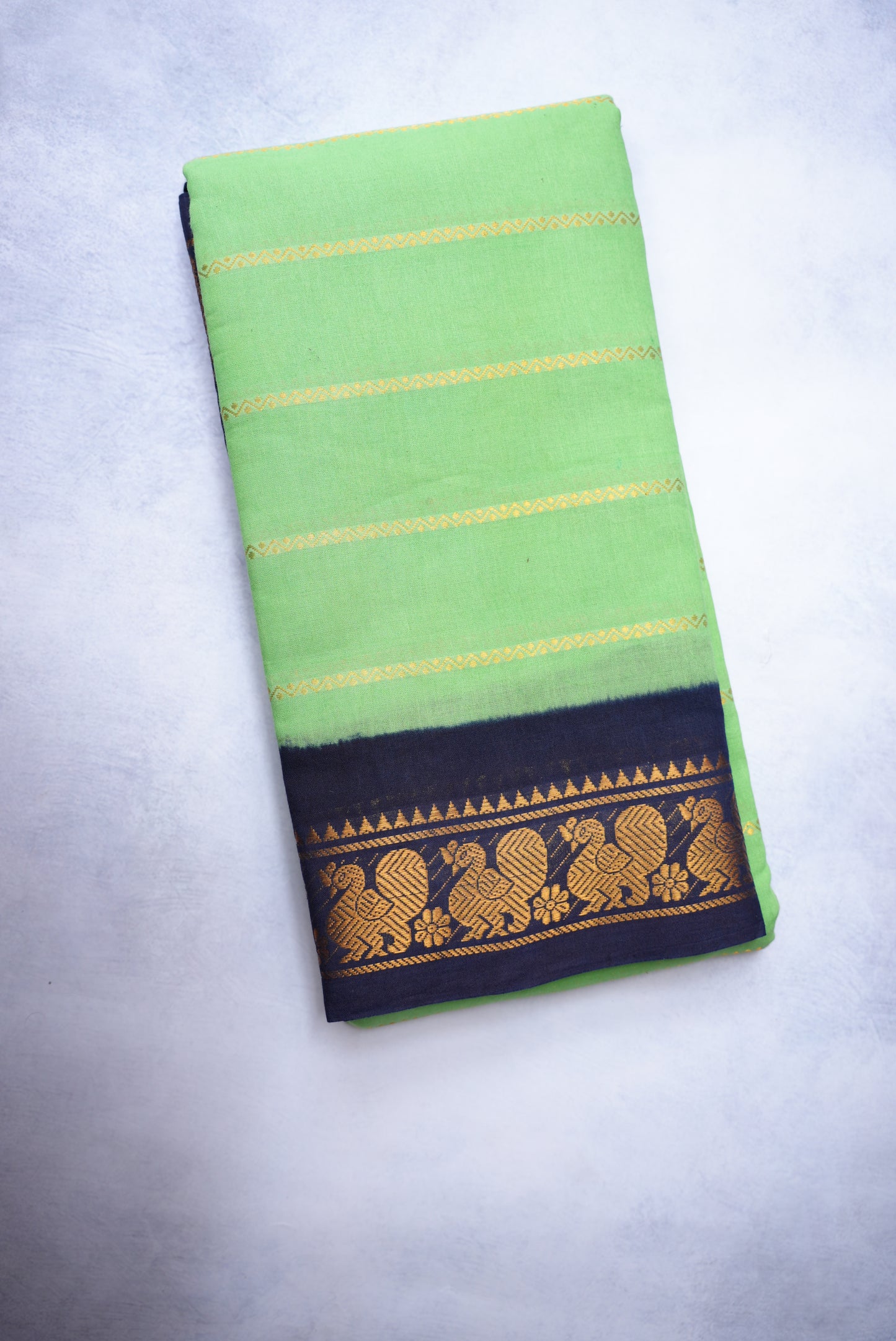 Sungudi Cotton Saree – Green with Dark Blue Velthari Border
