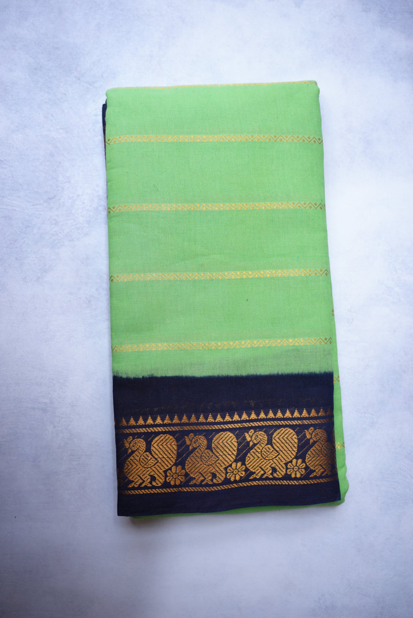 Sungudi Cotton Saree – Green with Dark Blue Velthari Border