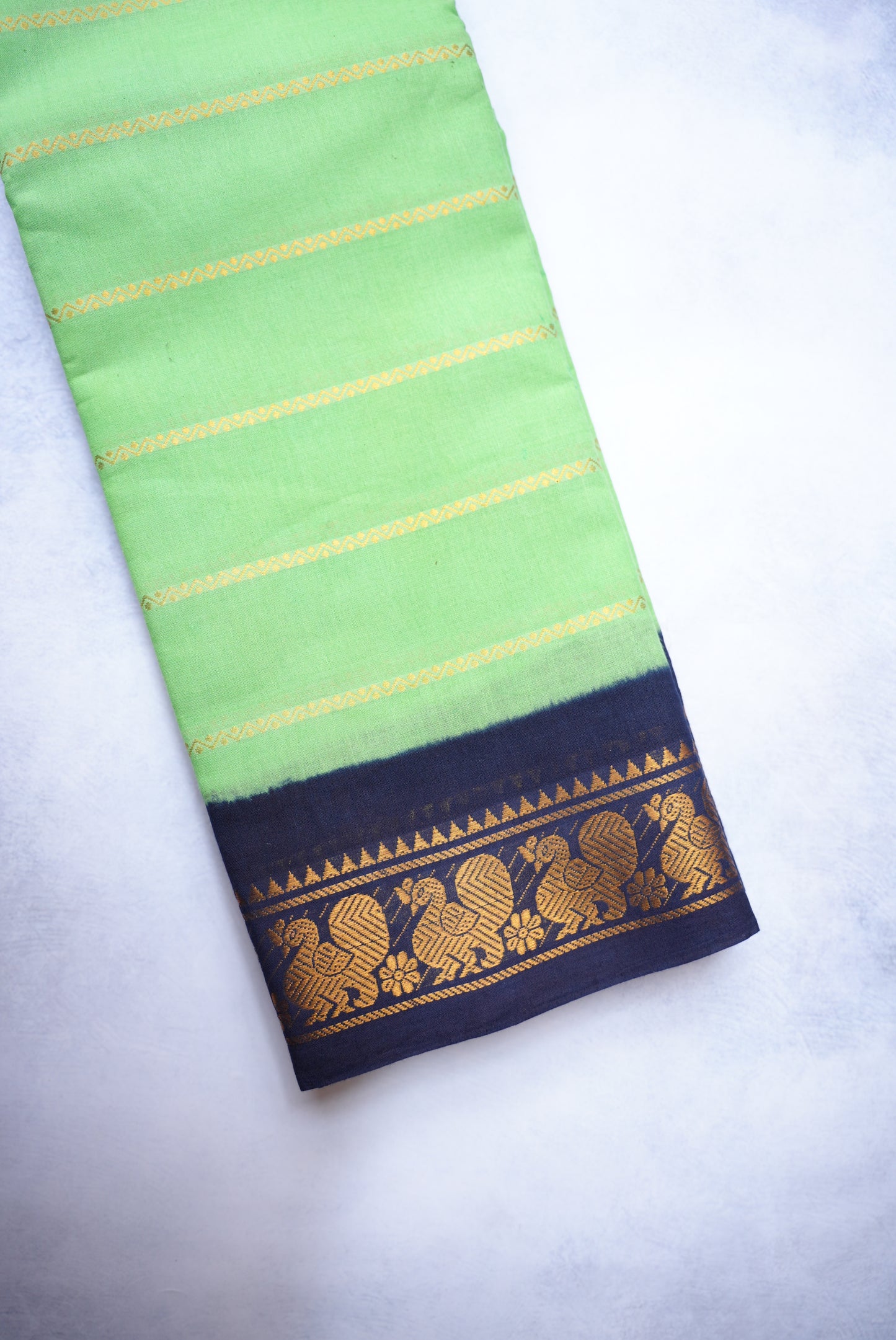 Sungudi Cotton Saree – Green with Dark Blue Velthari Border