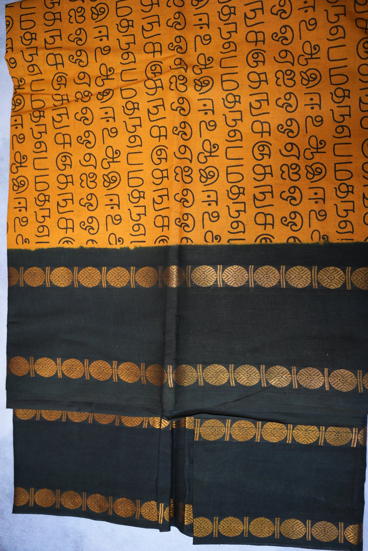 Tamil Letter Printed Sungudi Saree – Dark Sandal Color with Black Border