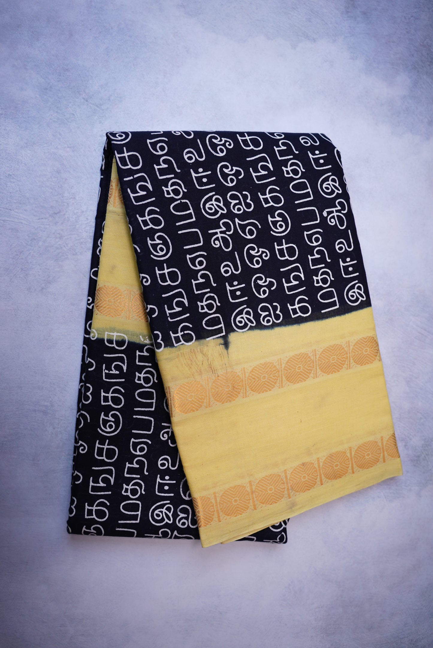 Tamil Letter Printed Sungudi Saree – Black with light Lemon Yellow Border