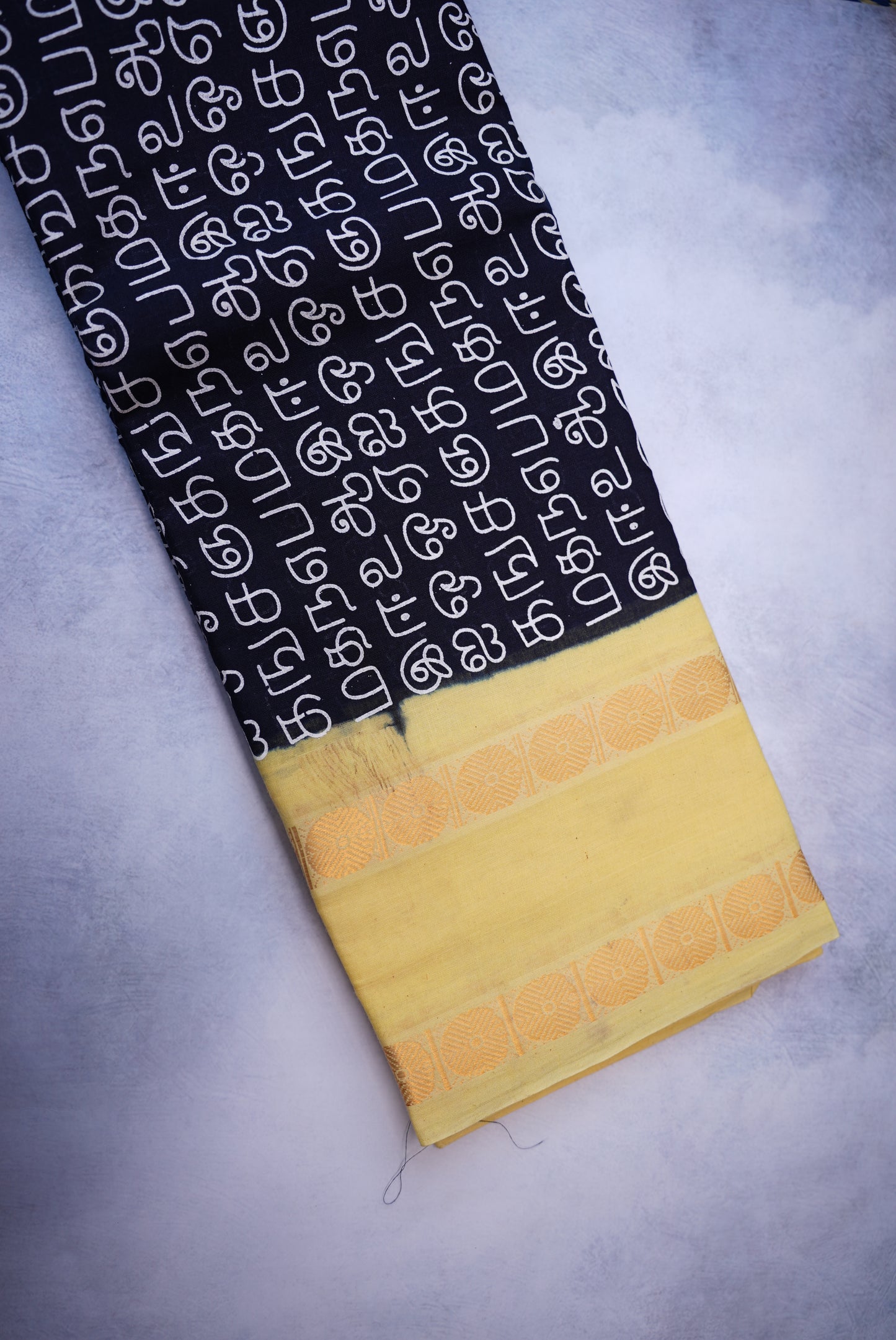 Tamil Letter Printed Sungudi Saree – Black with light Lemon Yellow Border
