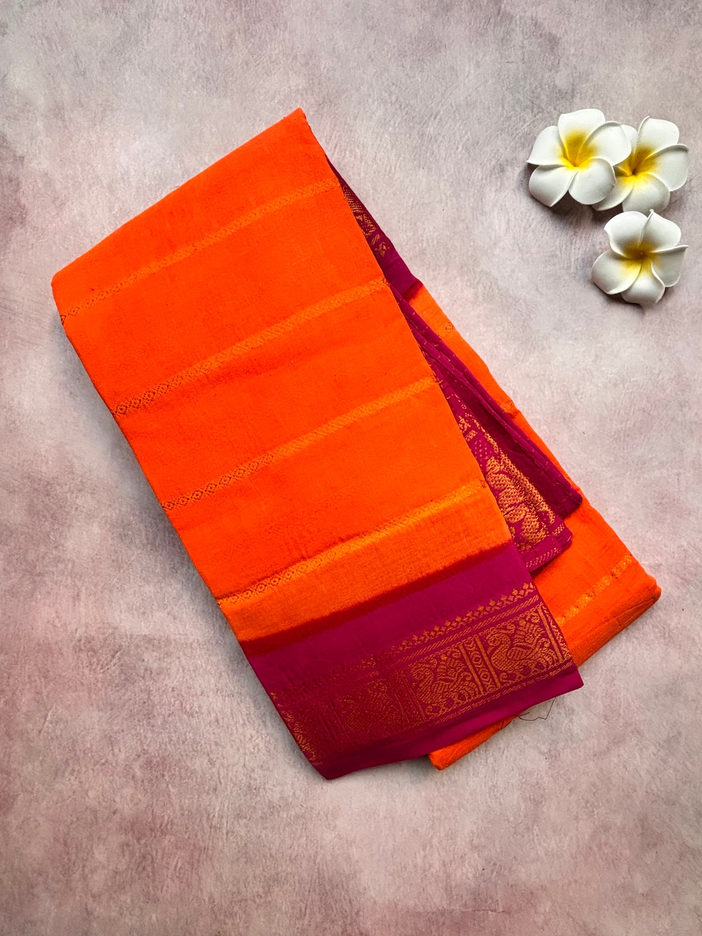 Carrot Orange Velthari Sungudi Cotton Saree with Pink Border