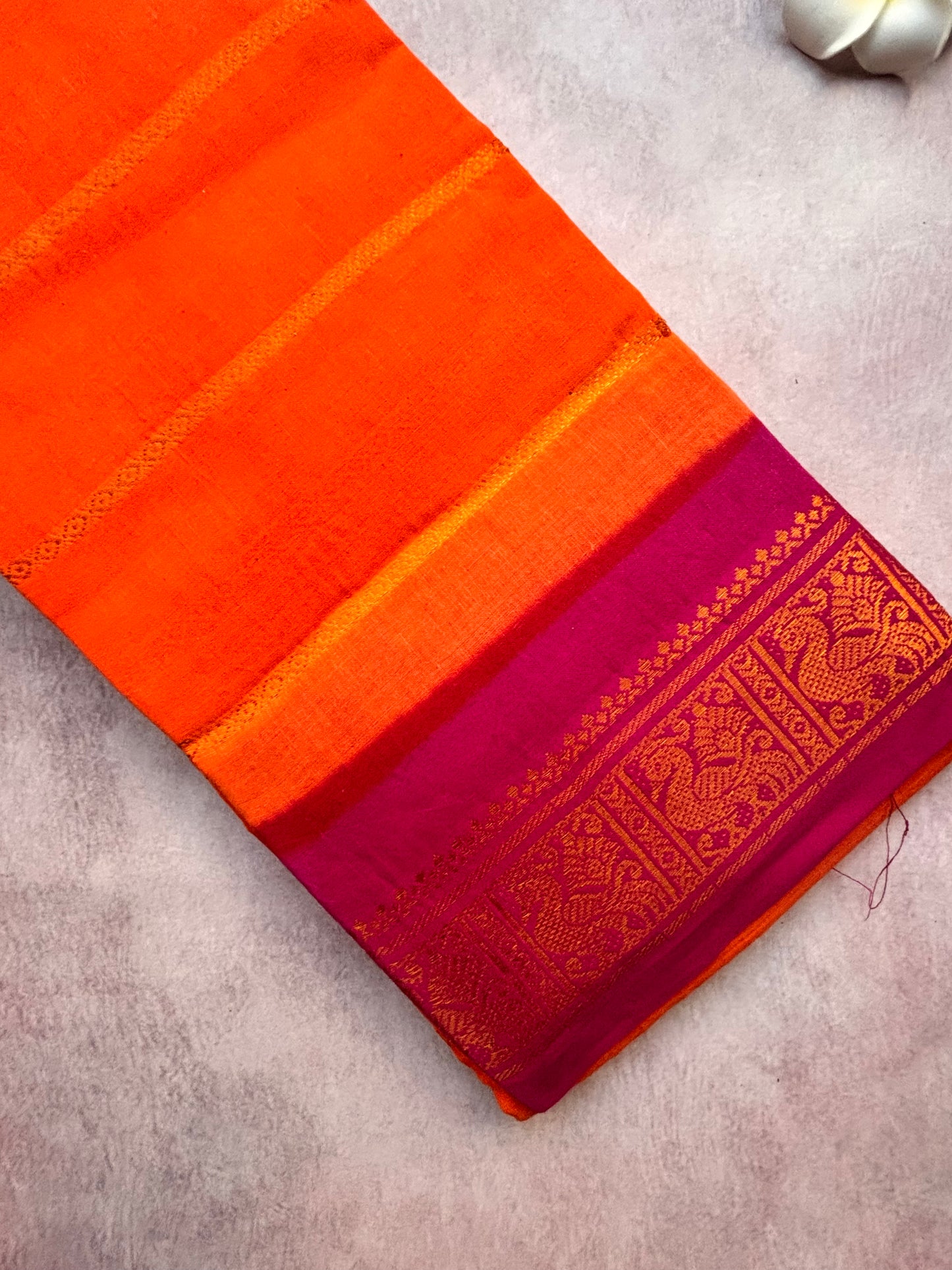 Carrot Orange Velthari Sungudi Cotton Saree with Pink Border