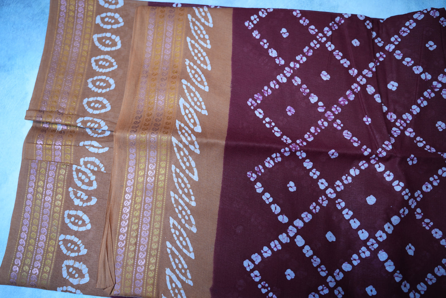 Batik Cross Print Maroon Saree with Orange Border