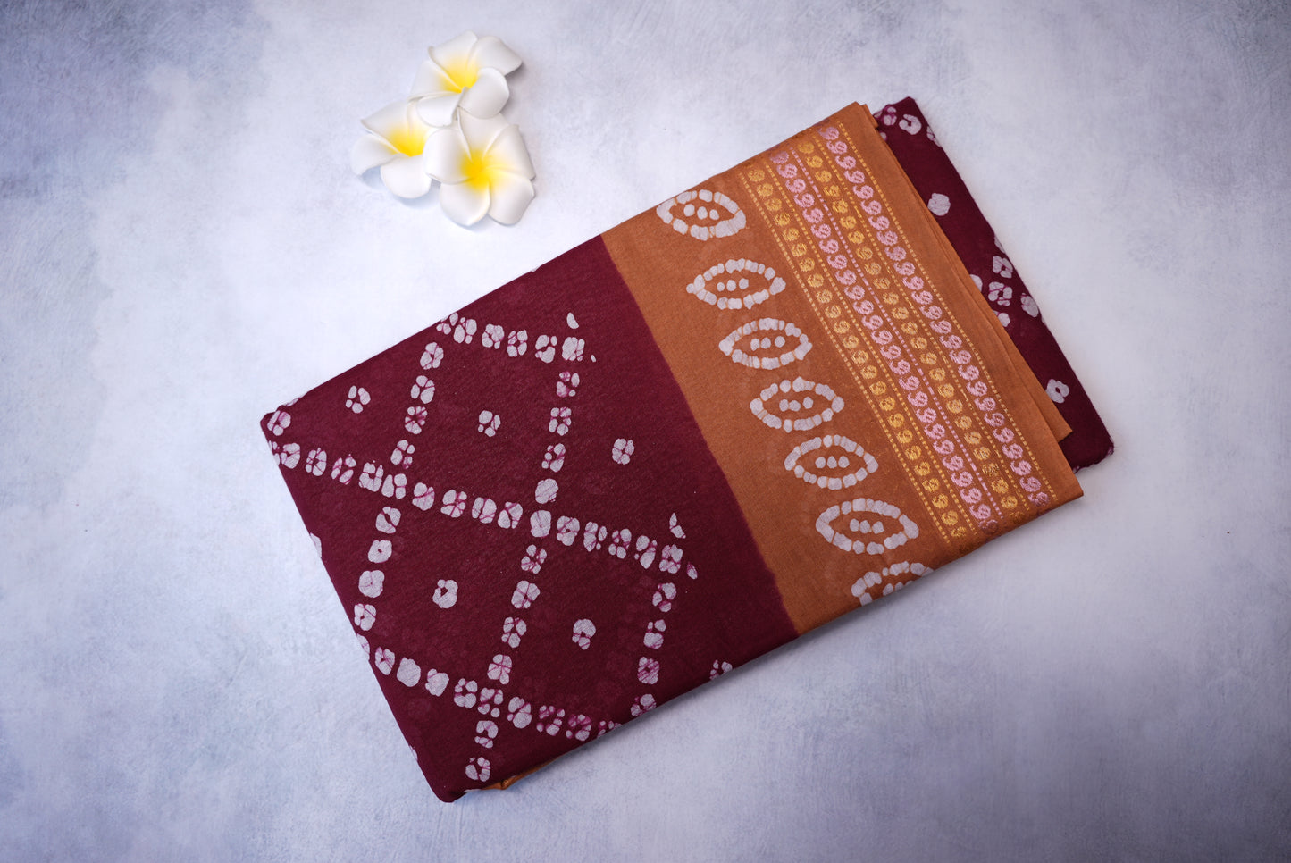 Batik Cross Print Maroon Saree with Orange Border
