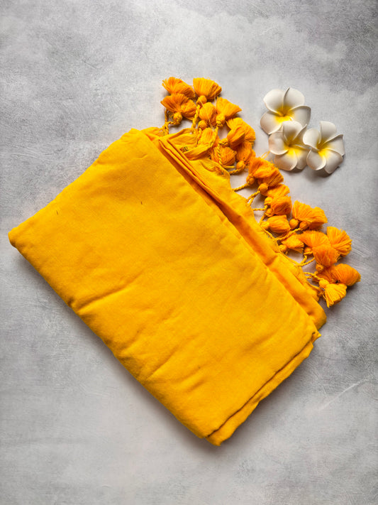 Plain mango Yellow Kadhi Cotton Saree with Yellow Tassels | The Laya Looms