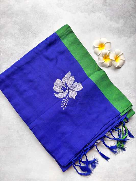 Royal Blue Kadhi Cotton Saree with White Hibiscus Embroidery & Green Border | The Laya Looms