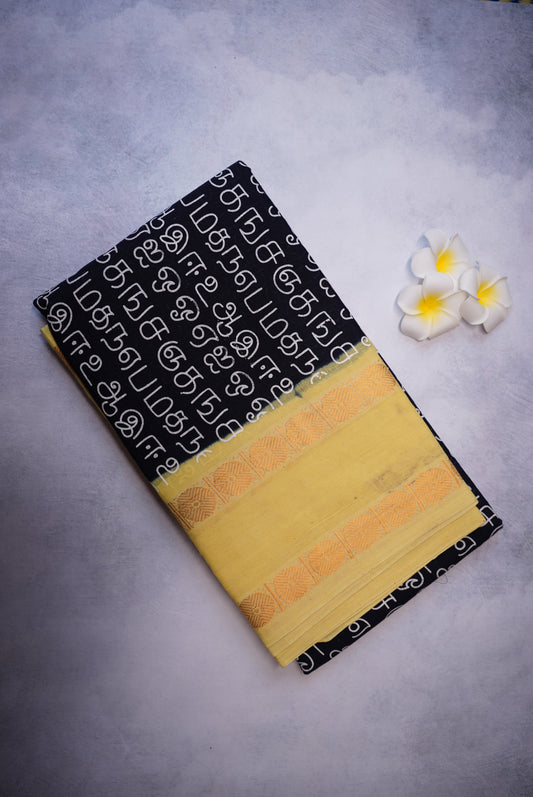 Tamil Letter Printed Sungudi Saree – Black with light Lemon Yellow Border