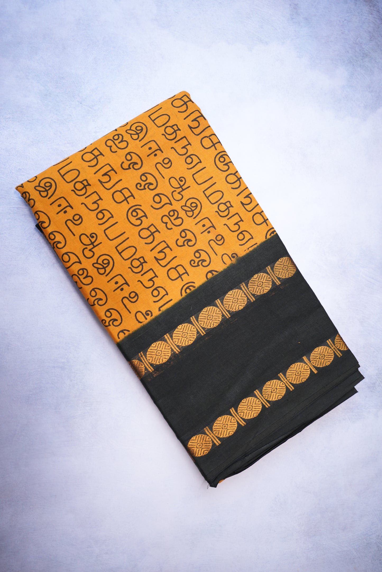 Tamil Letter Printed Sungudi Saree – Dark Sandal Color with Black Border