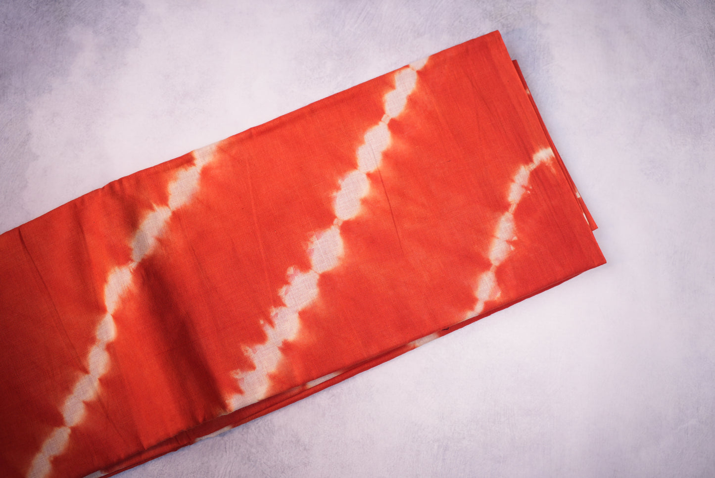 Orange Shibori Saree with White Cross Tie and Dye