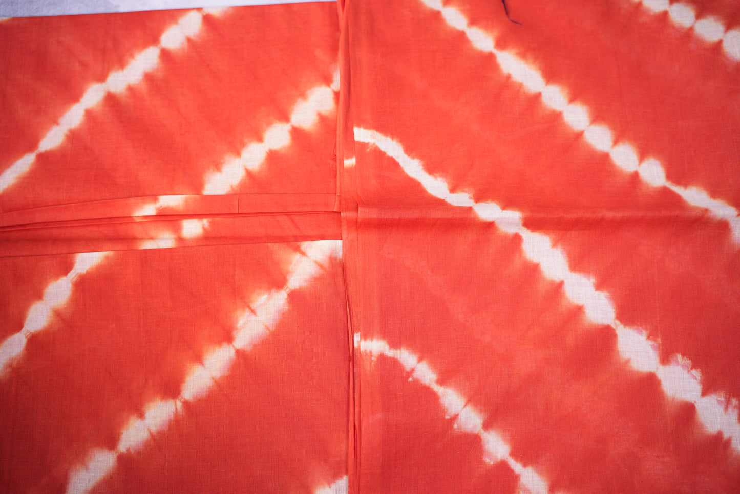 Orange Shibori Saree with White Cross Tie and Dye