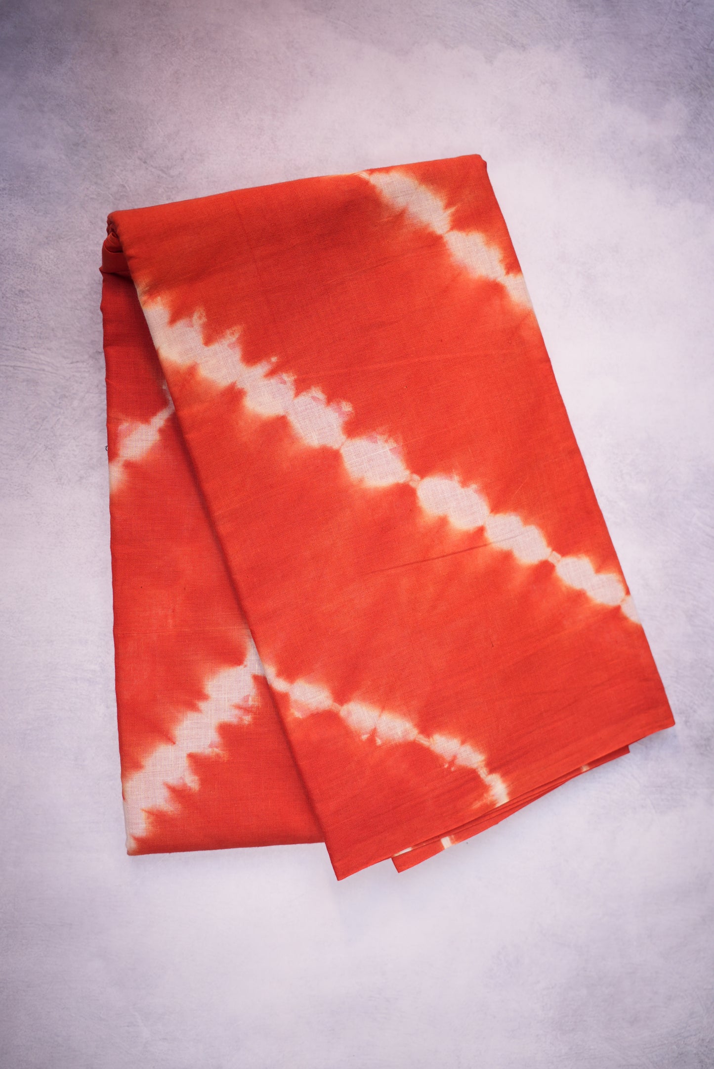 Orange Shibori Saree with White Cross Tie and Dye