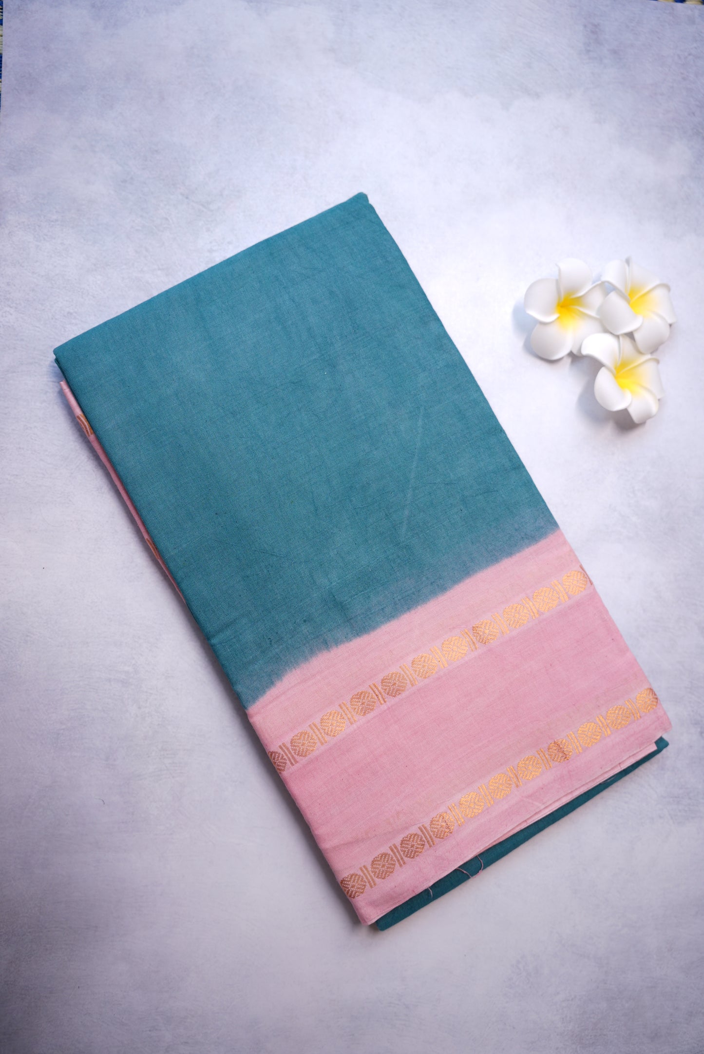 Teal Blue Sungudi Saree with Pink Border and Rudraksha Detailing