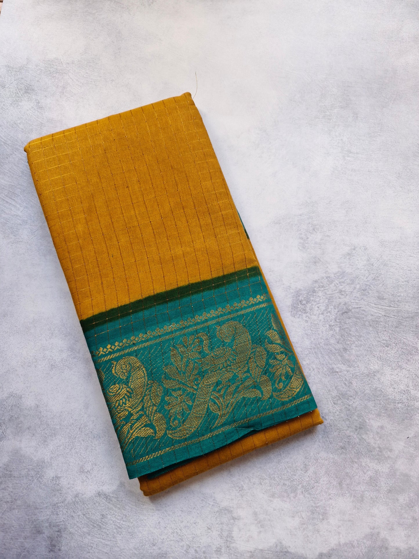 Golden zari checked  Teal Blouse border, and Light Brown sungudi saree